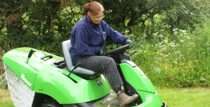 Cutting the grass, Jan and Jacqui, luxury holiday cottages in pembrokeshire, dog friendly cottages west wales